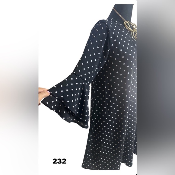 Brand: NAIF, black dress, with white dots, and flared sleeves - Picture 11 of 12
